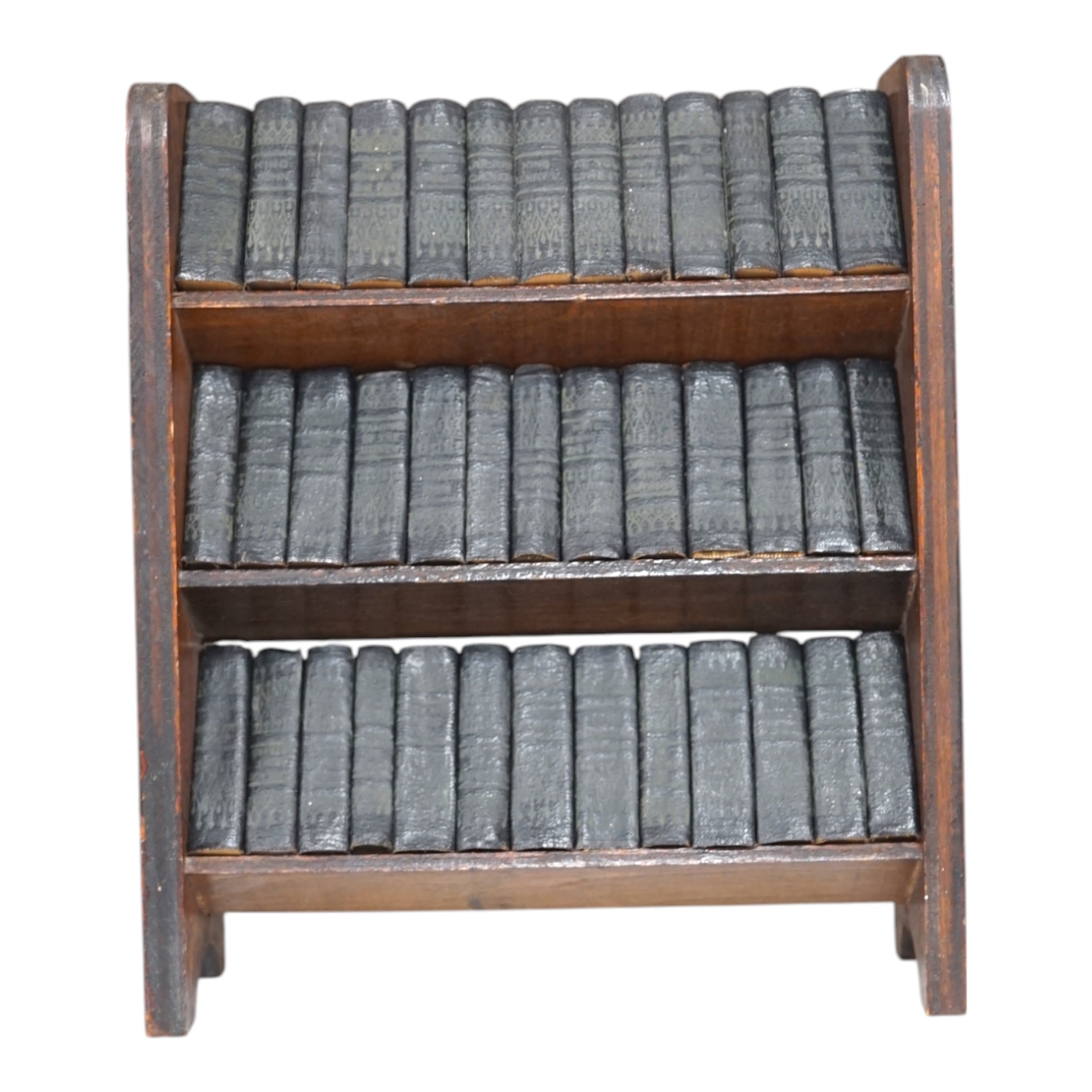 Miniature printing - The Works of Shakespeare, 40 vols, each 3.5 x 5cms, The Allied Press Newspaper, c. 1932, in custom made miniature plywood bookcase, 22.5cm high. Condition - fair to good.